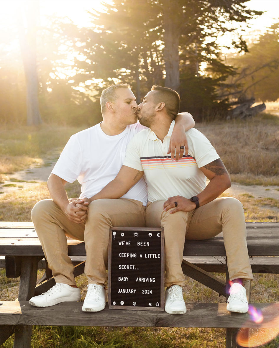 gay couple baby announcement golden hour